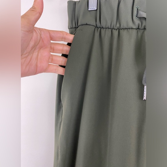Lululemon Women’s Size 4 On the Fly 7/8 Pant Woven Dark Olive - Picture 12 of 14